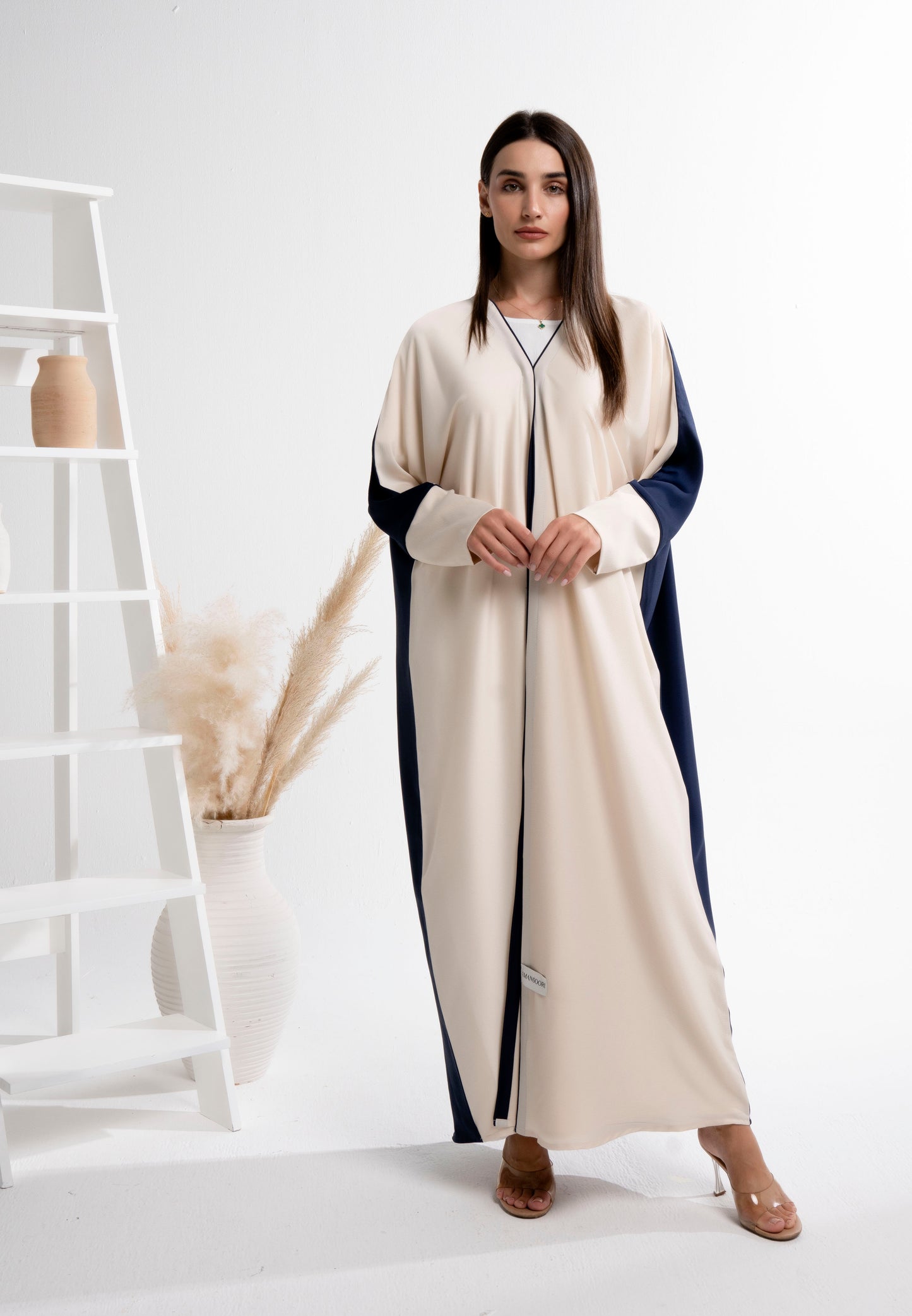 Girl wearing Bahraini style abaya