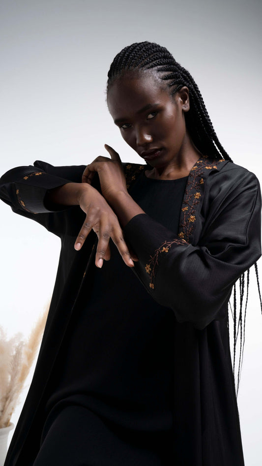 Silk satin abaya with floral embroidery for sale in Dubai