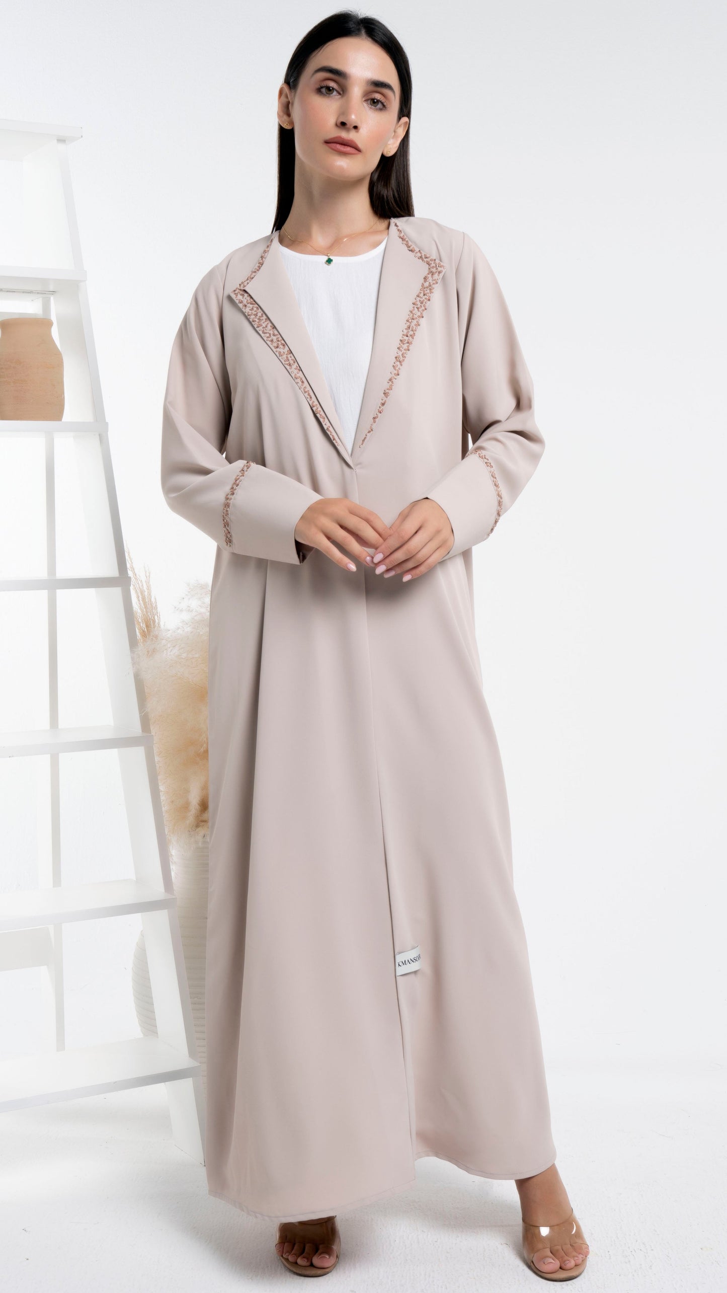 Double collar abaya with floral embroidery detailing on sleeves and collar.