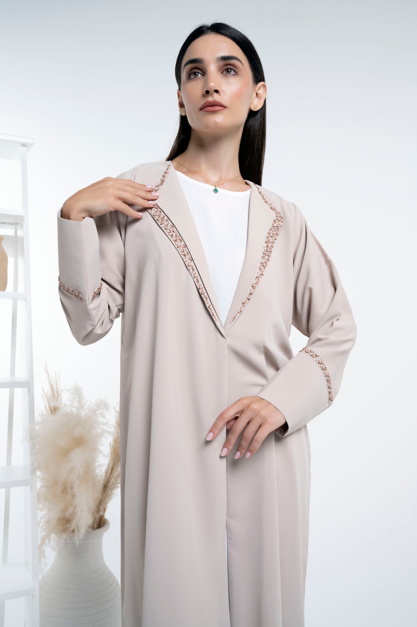 Beige abaya having double collar with floral embroidery on sleeves and collar