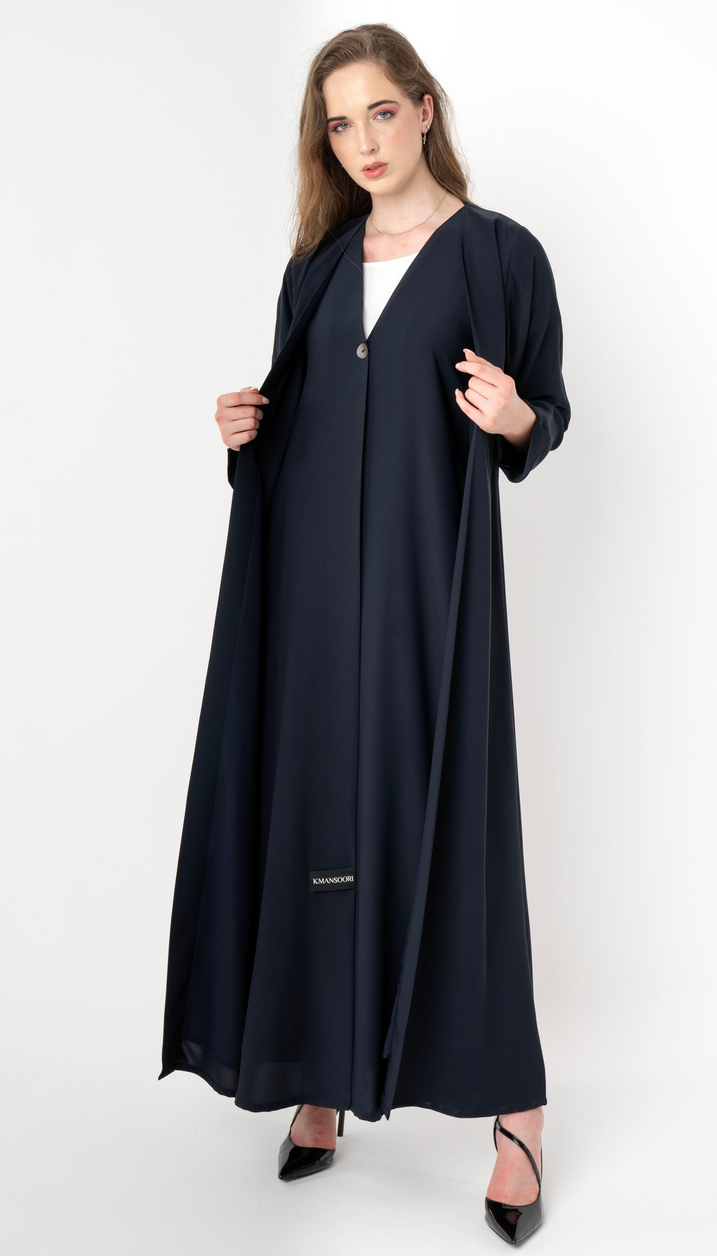 Double Layered Abaya With Elegantly Embellished Button Adorning The Front