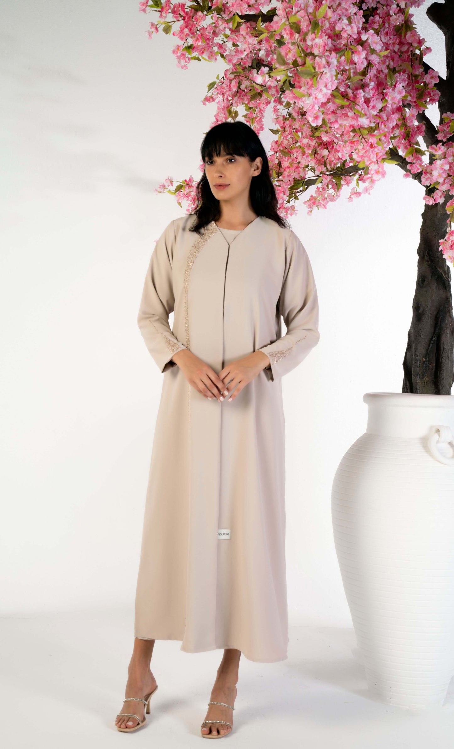 Soft Fabric Beige Abaya With Elegant Curve Line Pattern Bead Work On Front