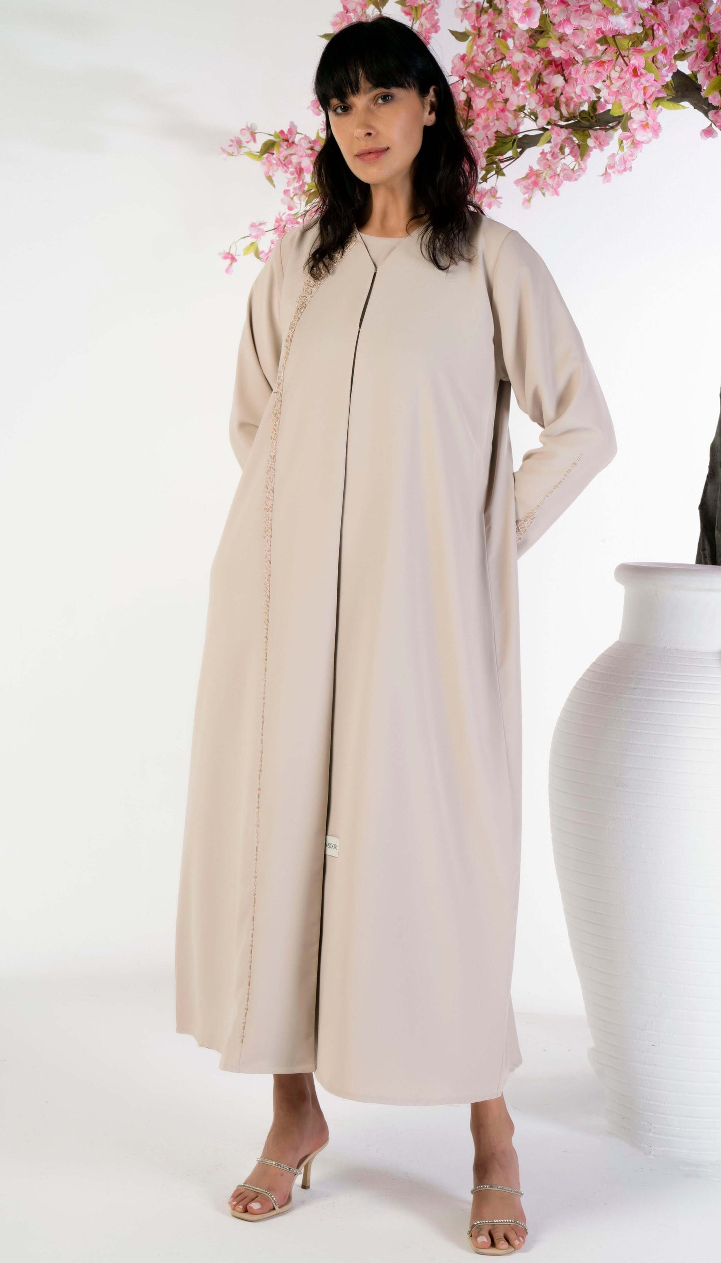 Beige Soft Fabric Abaya With Elegant Curve Line Pattern Bead Work On Front