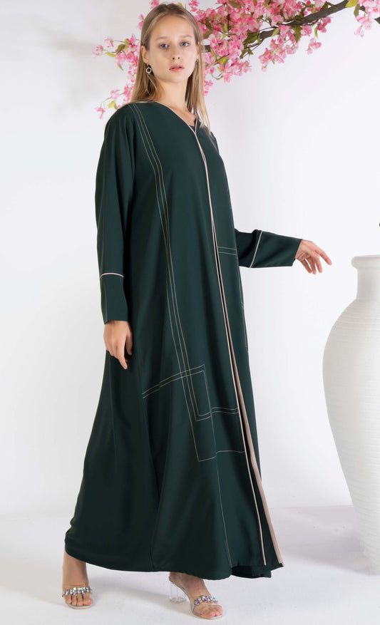 عباية خضراء مع خط وخياطة هندسية باللون البيج
