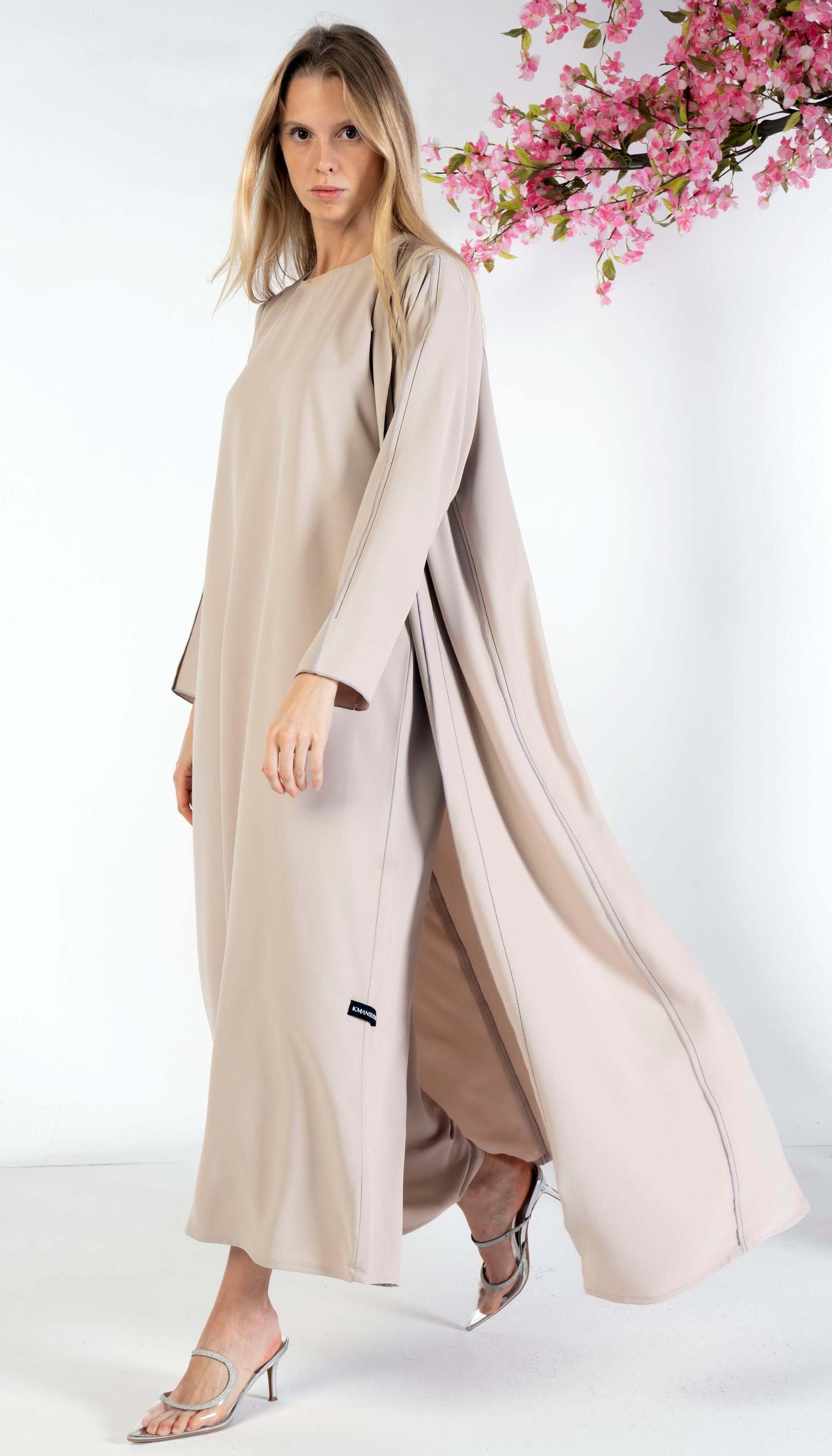 Stylised Pattern Beige Abaya With Contrast Color Stitch Line Design