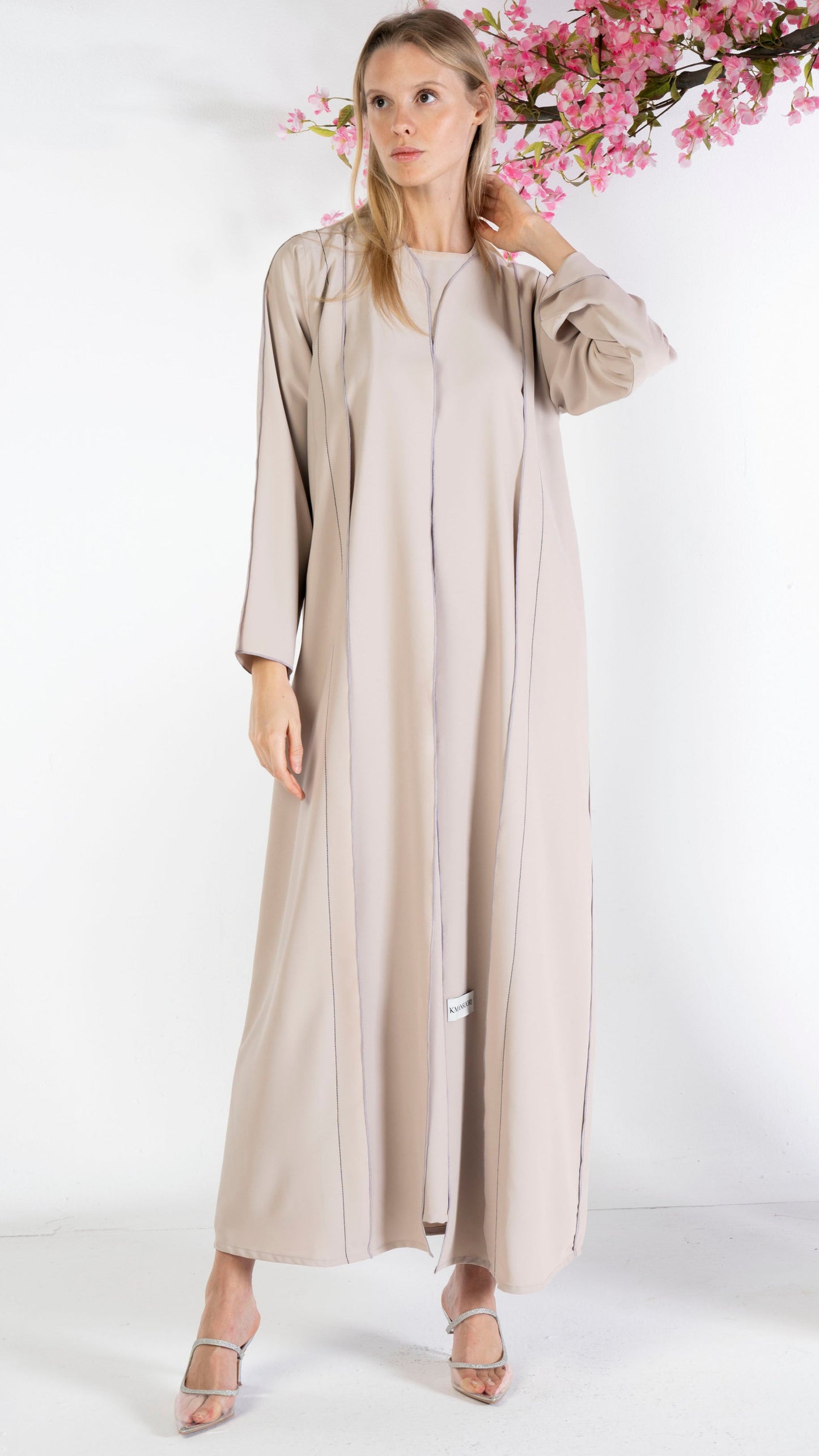Beige abaya with contrast color stitch line