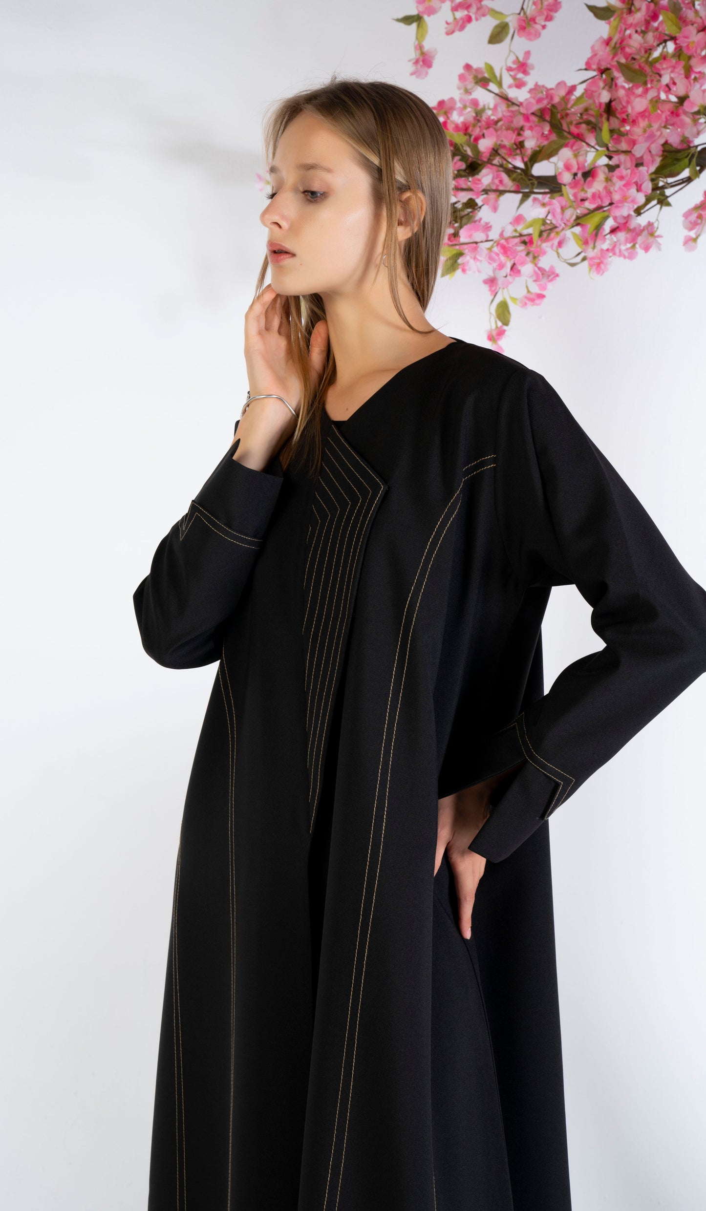 Girl wearing black abaya for women