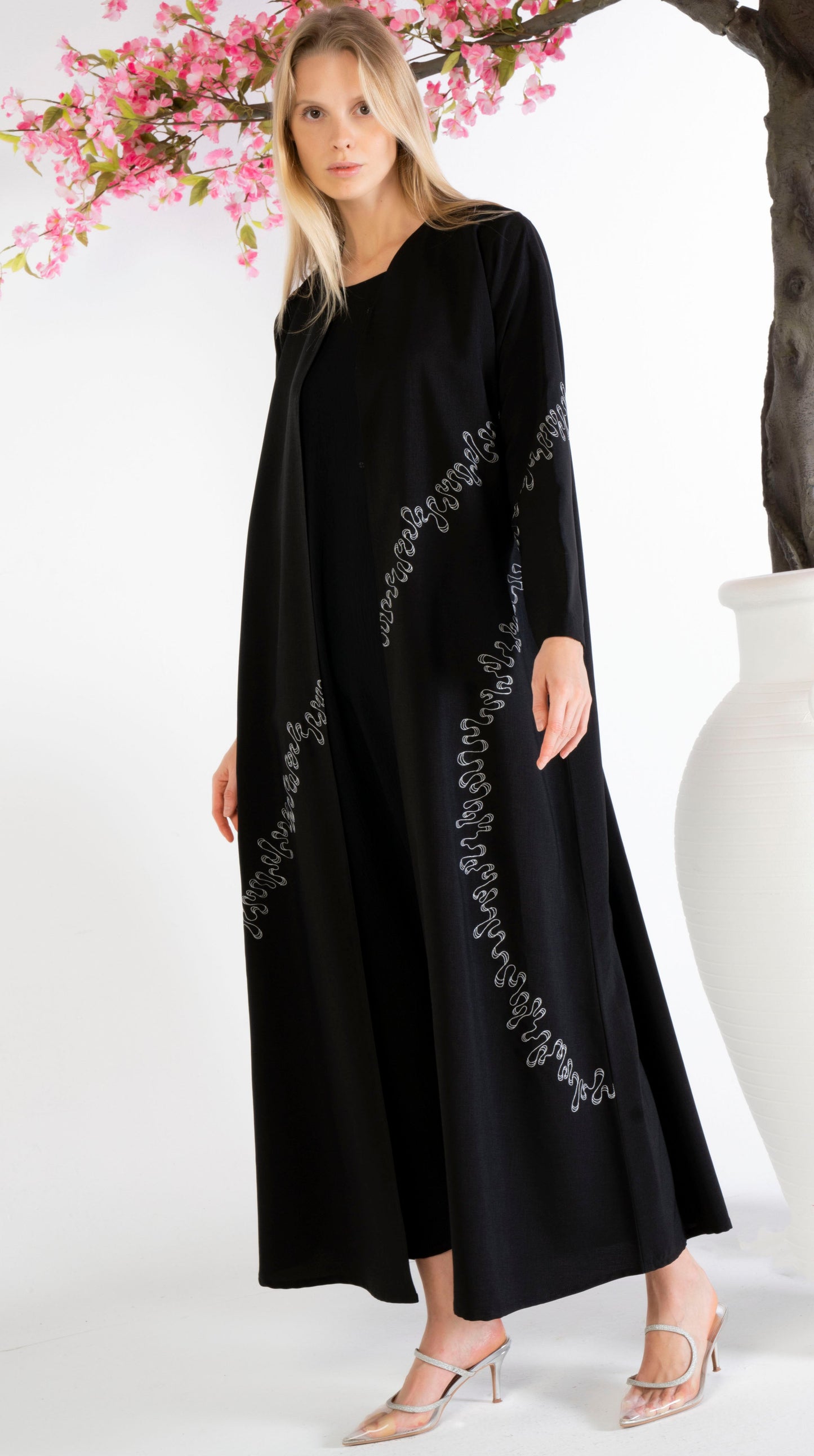 Elegant White Embroidery Detailing On Black Abaya