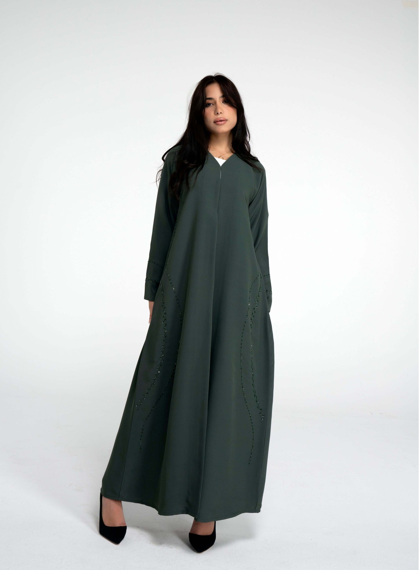 Curve design and embellished green abaya