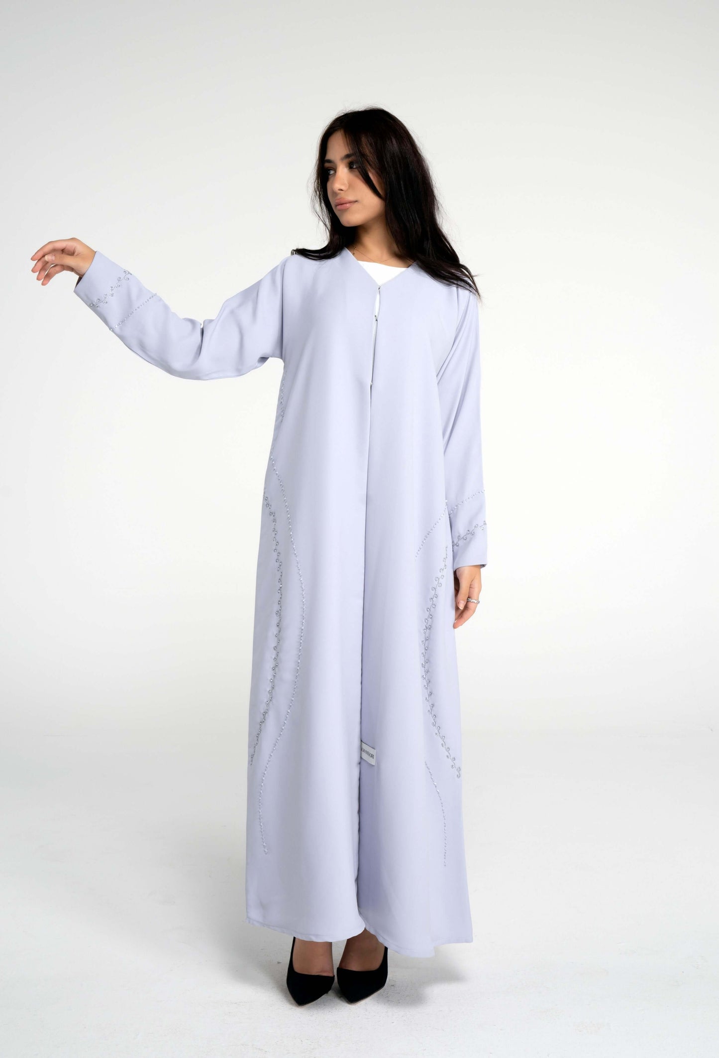 Light grey abaya with curve design embellishments