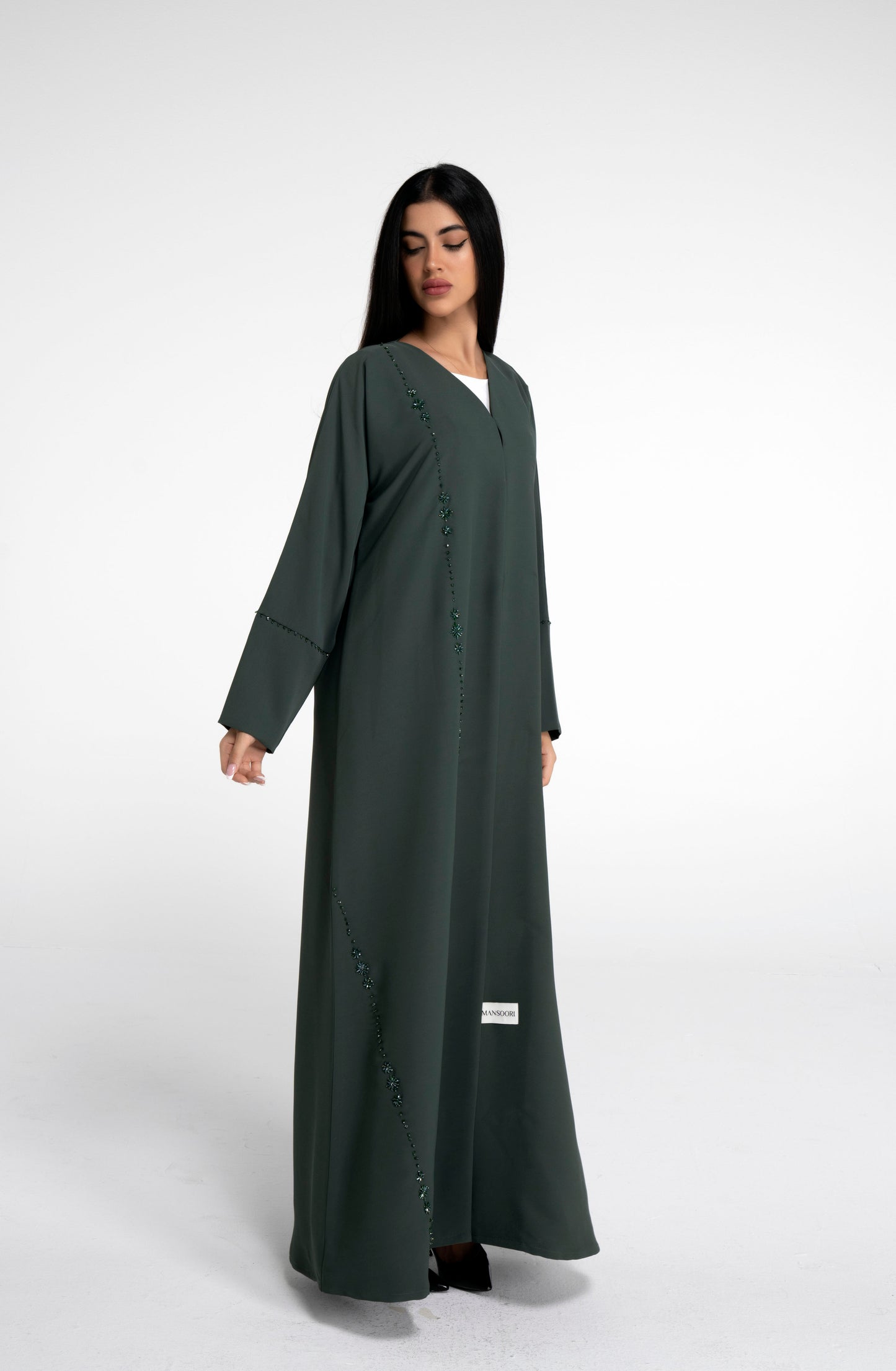 Abaya with flower motif design line on front and simple bead line on sleeve