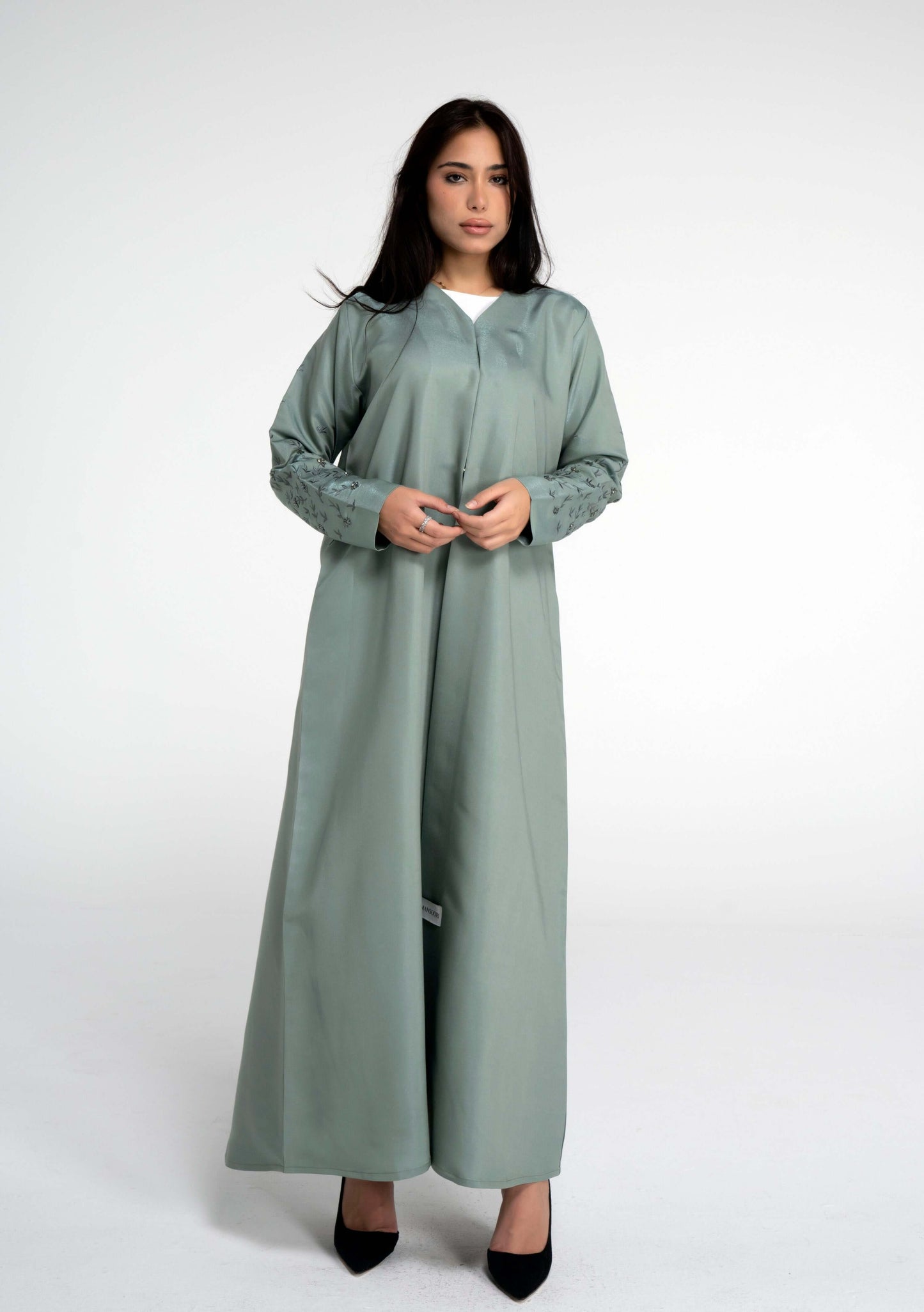Full view of light green abaya with floral thread embroidered sleeve s