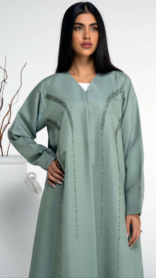 Light green colored abaya with princess bead embellishment