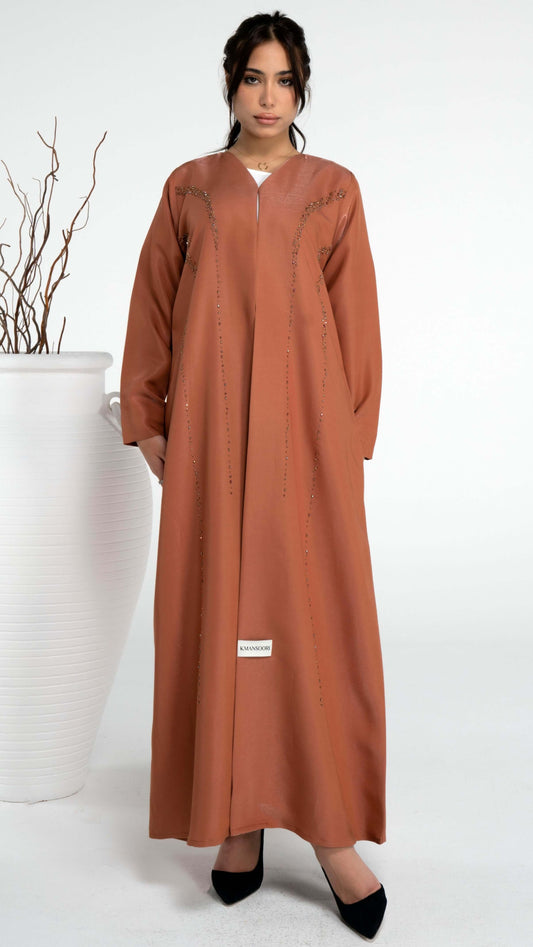 Orange abaya with princess line bead embellishments