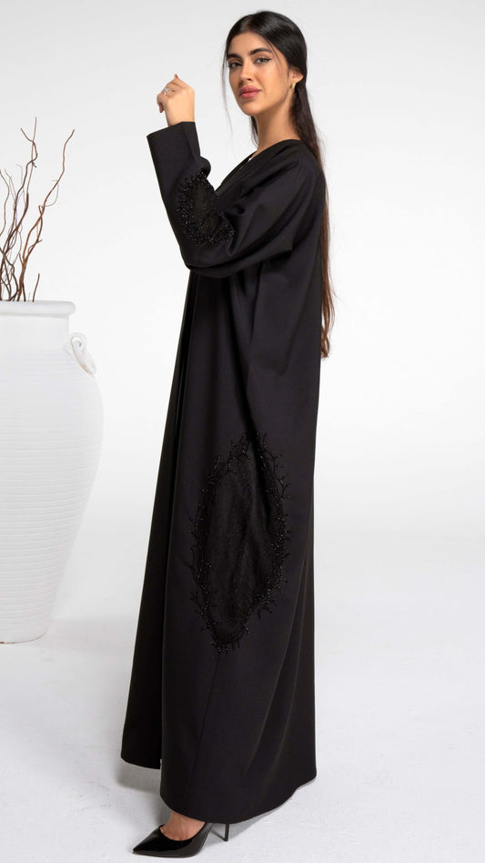 Black net abaya with beads on side and sleeves.