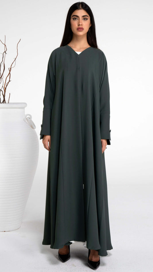 Girl wearing green abaya