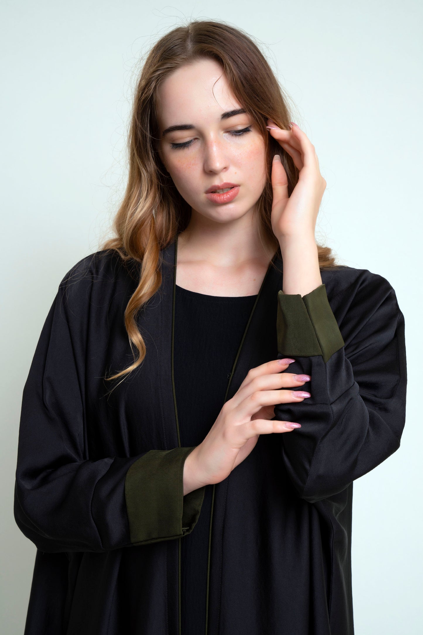 Detailed view of Bahrini Style Black Abaya With Green Cuff Sleeve