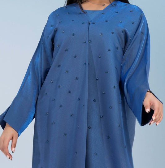 Delicate embellishments on sky blue bisht abaya