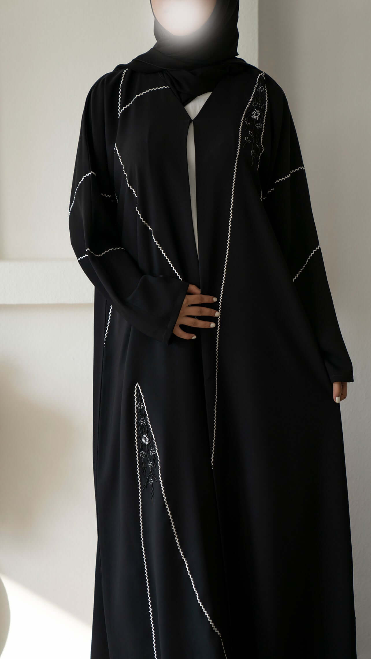 Black V-Neck Abaya with Intricate Embroidery and Delicate Bead Detailing Throughout