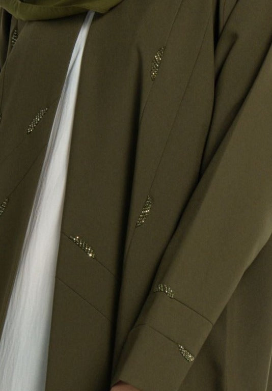 Line patterned beaded embellishments