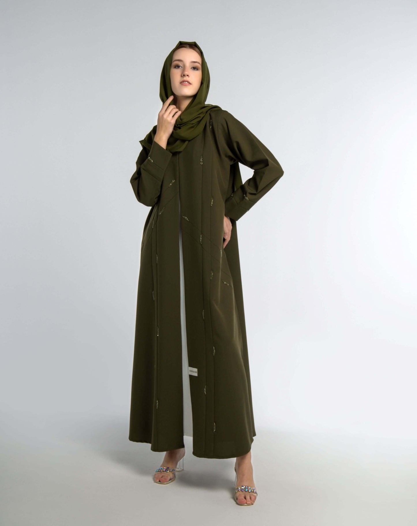 Green colored V-Neck abaya with elegant line-patterned beaded embellishments