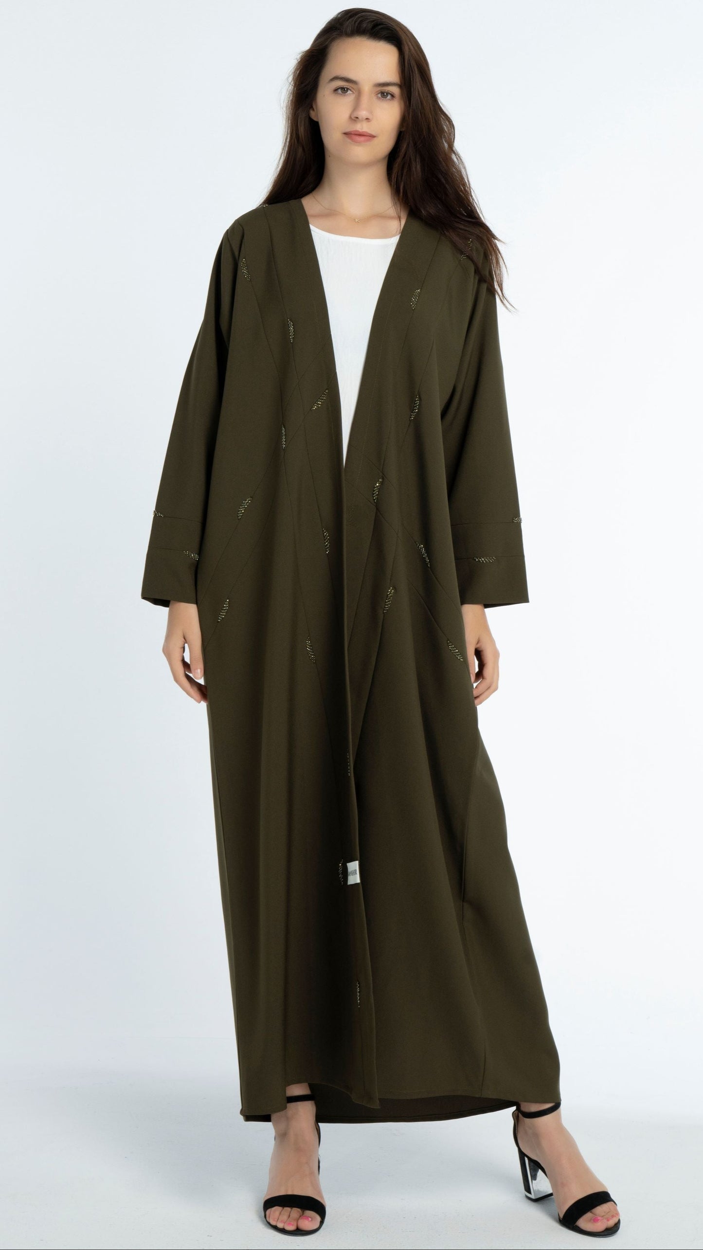 Green abaya with line-patterned worm bead embellishments