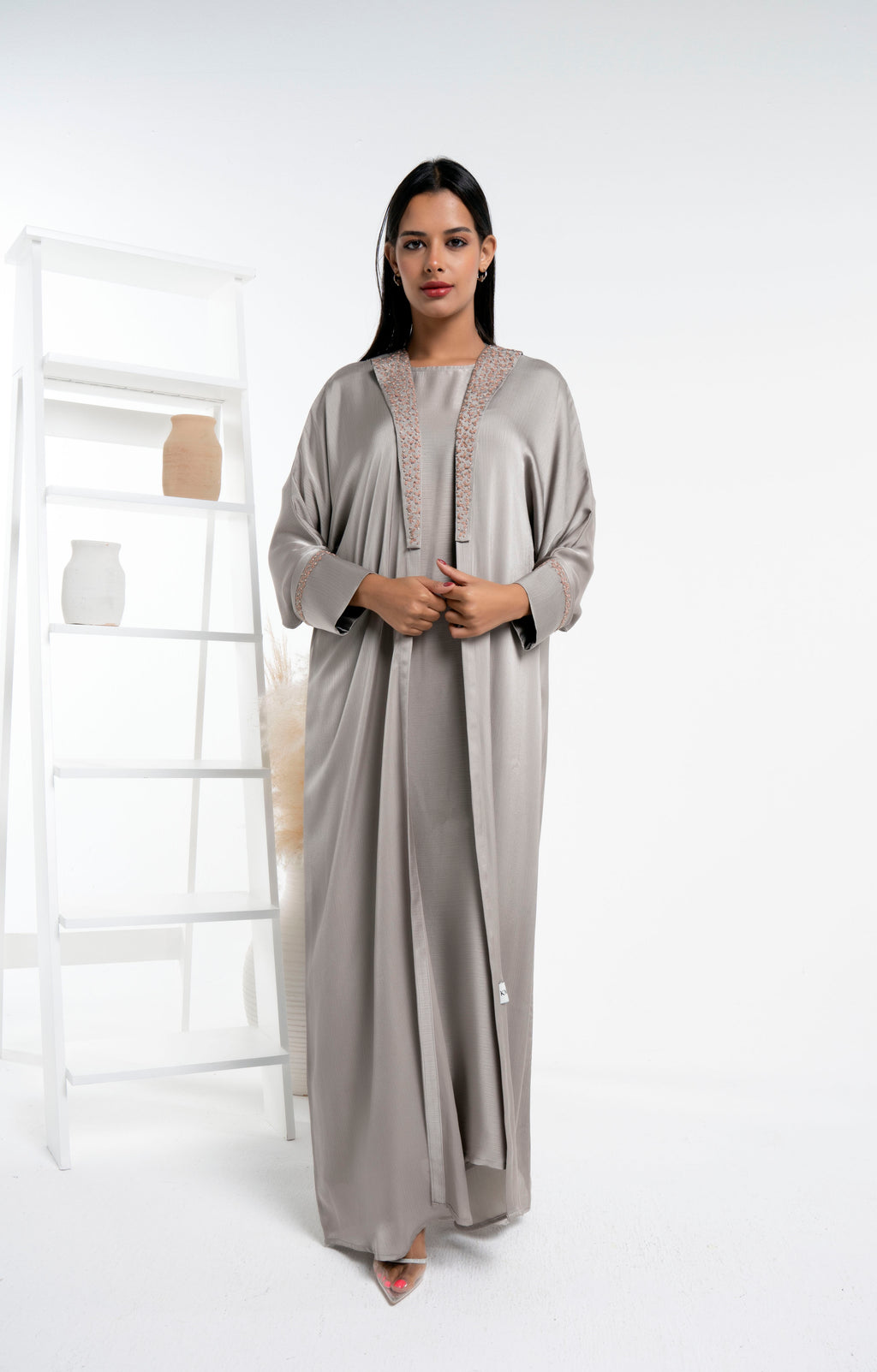 Silk satin abaya with floral embroidery on collar and cuff sleeves.