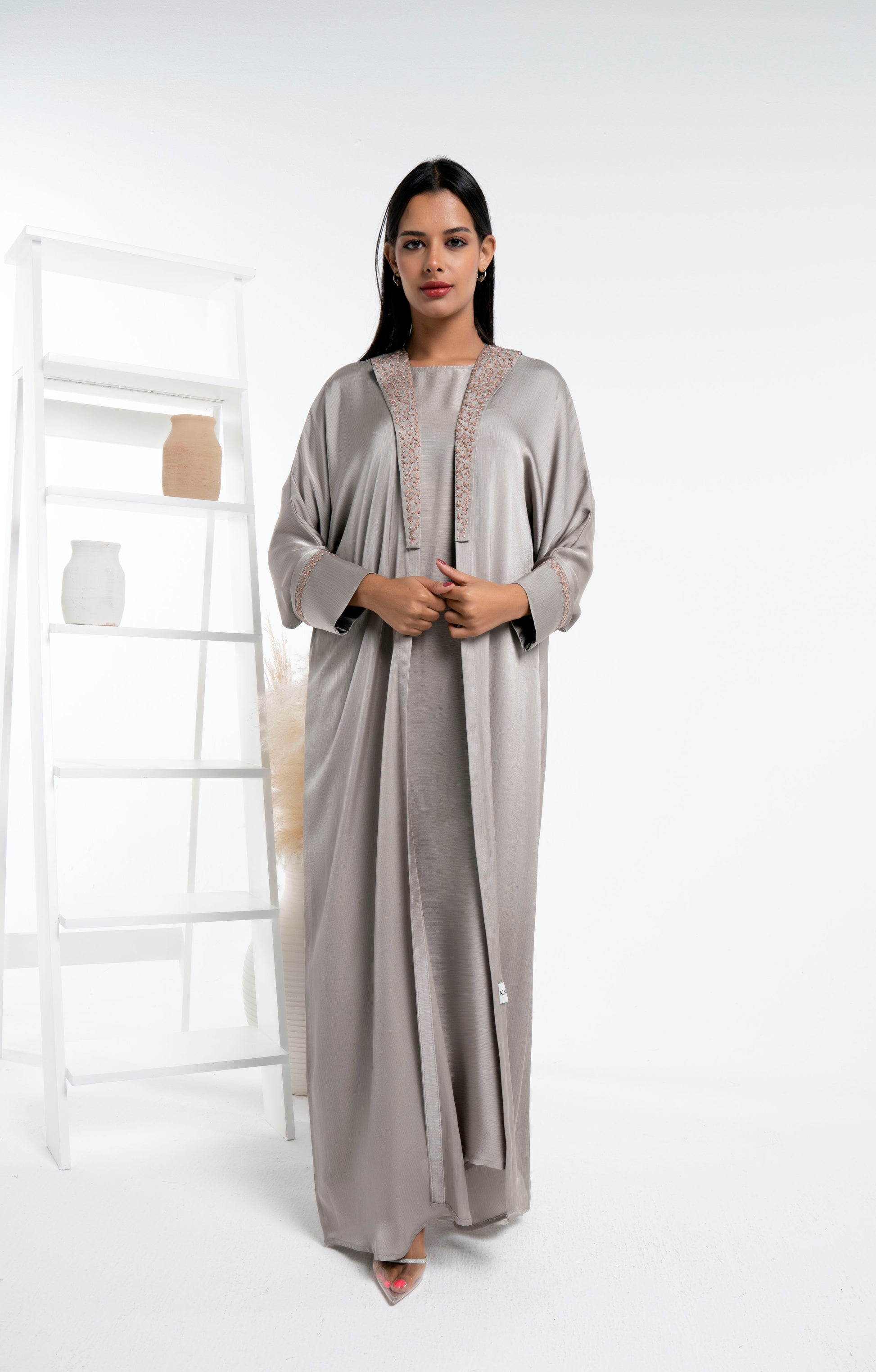 Silk satin abaya with floral embroidery on collar and cuff sleeves.