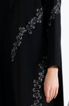 Elegant White Embroidery Detailing On Black Abaya