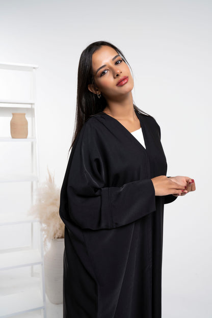 Girl wearing black abaya of Bahraini style