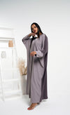 Girl wearing Bahraini style beige & brown color block abaya