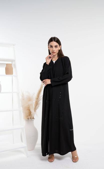 Black abaya with geometric design for sale in Dubai