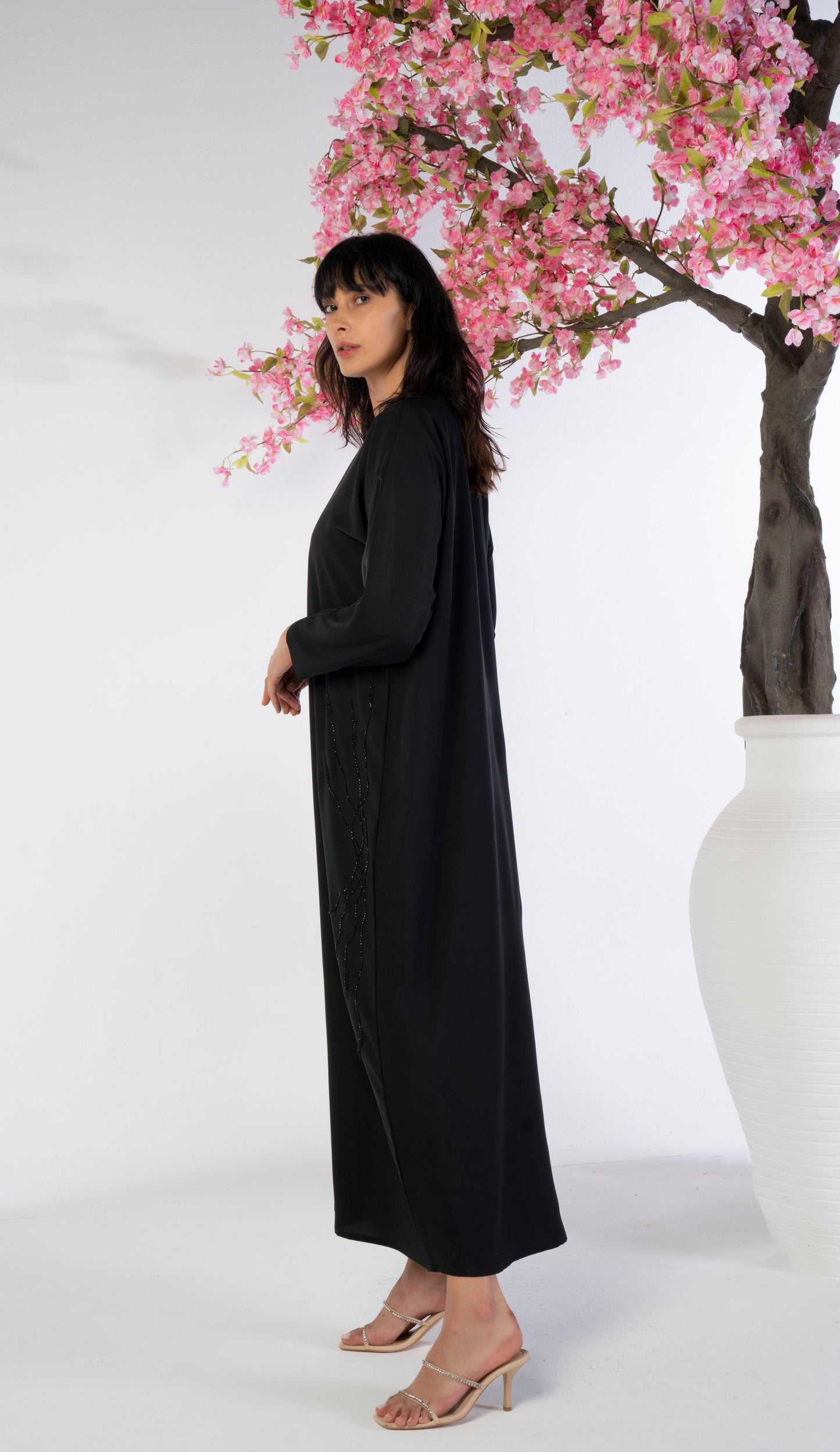 Black bisht abaya with floral embroidery on sides 