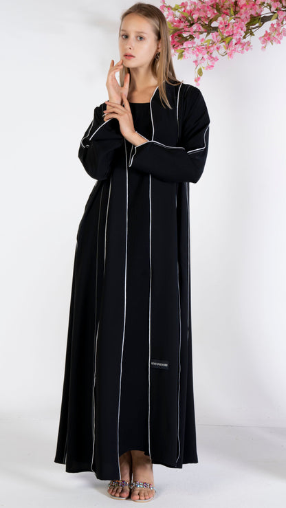 Black abaya with stylised pattern and contrast color stitch line