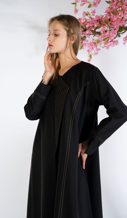 Girl wearing black abaya for women