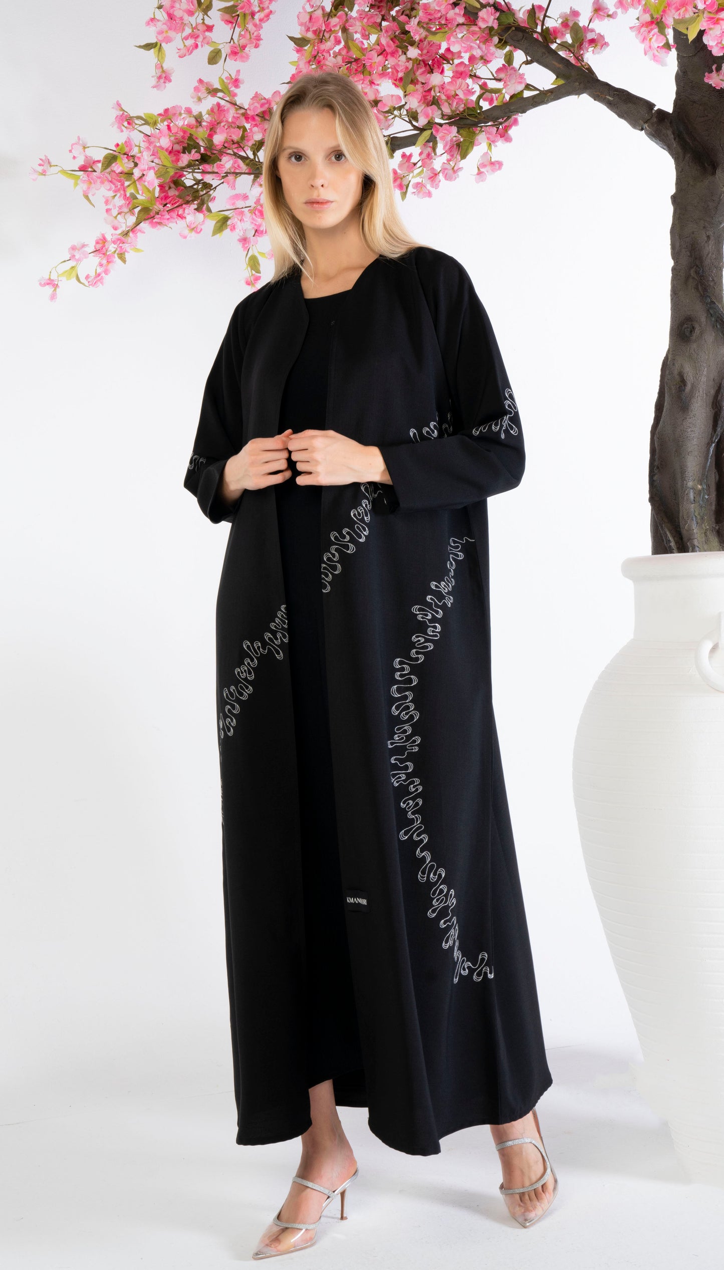 Elegant White Embroidery Detailing On Black Abaya