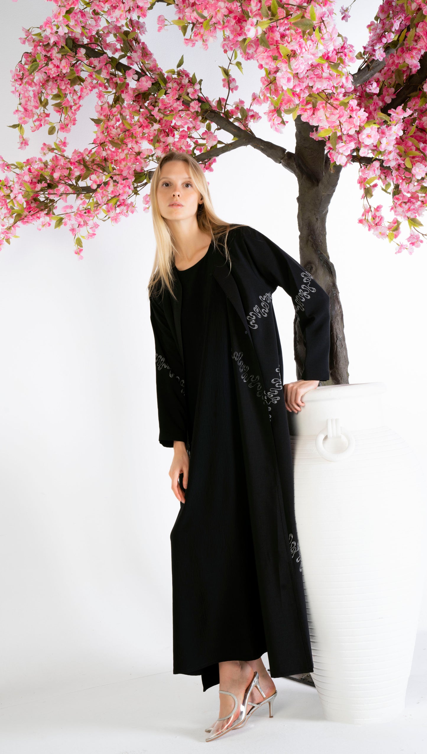 Elegant White Embroidery Detailing On Black Abaya