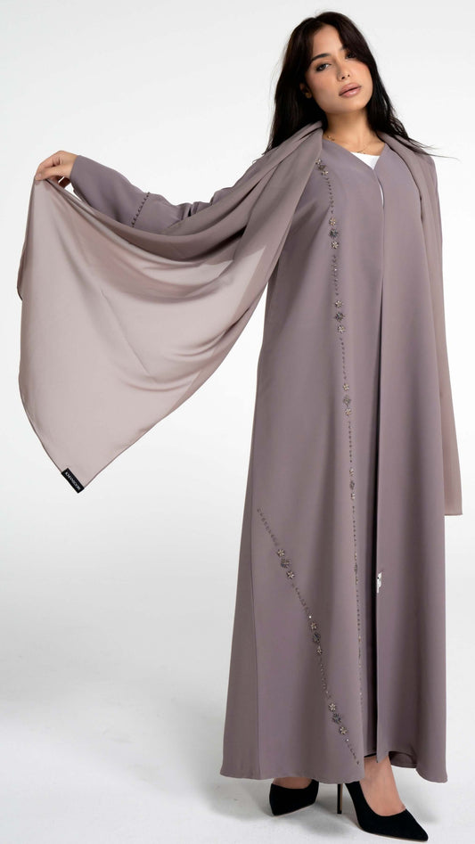 Brown abaya with flower motif design line.