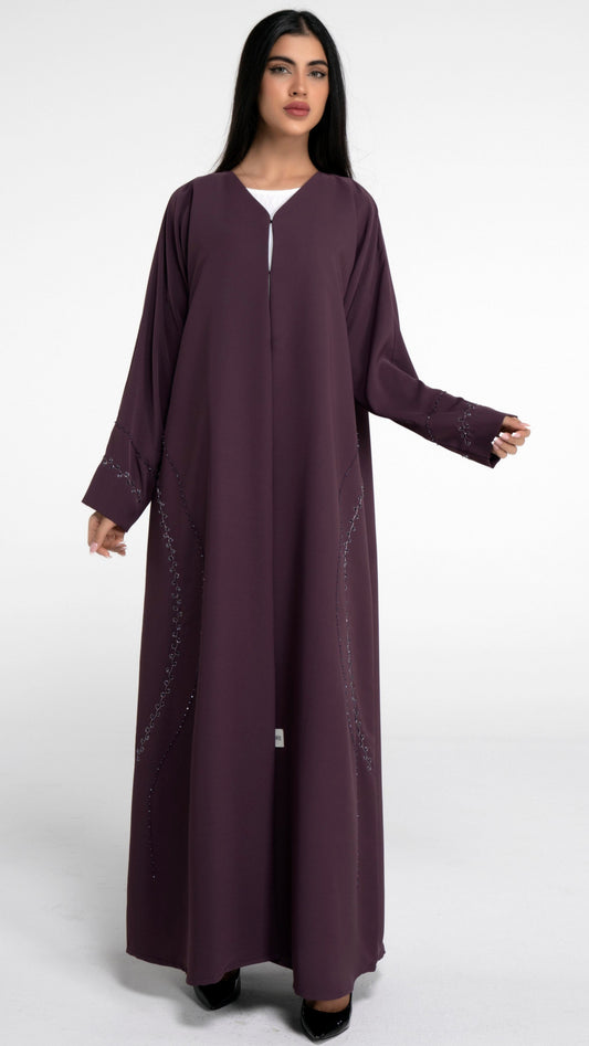 Purple abaya with curve design embellishment on front side and sleeve
