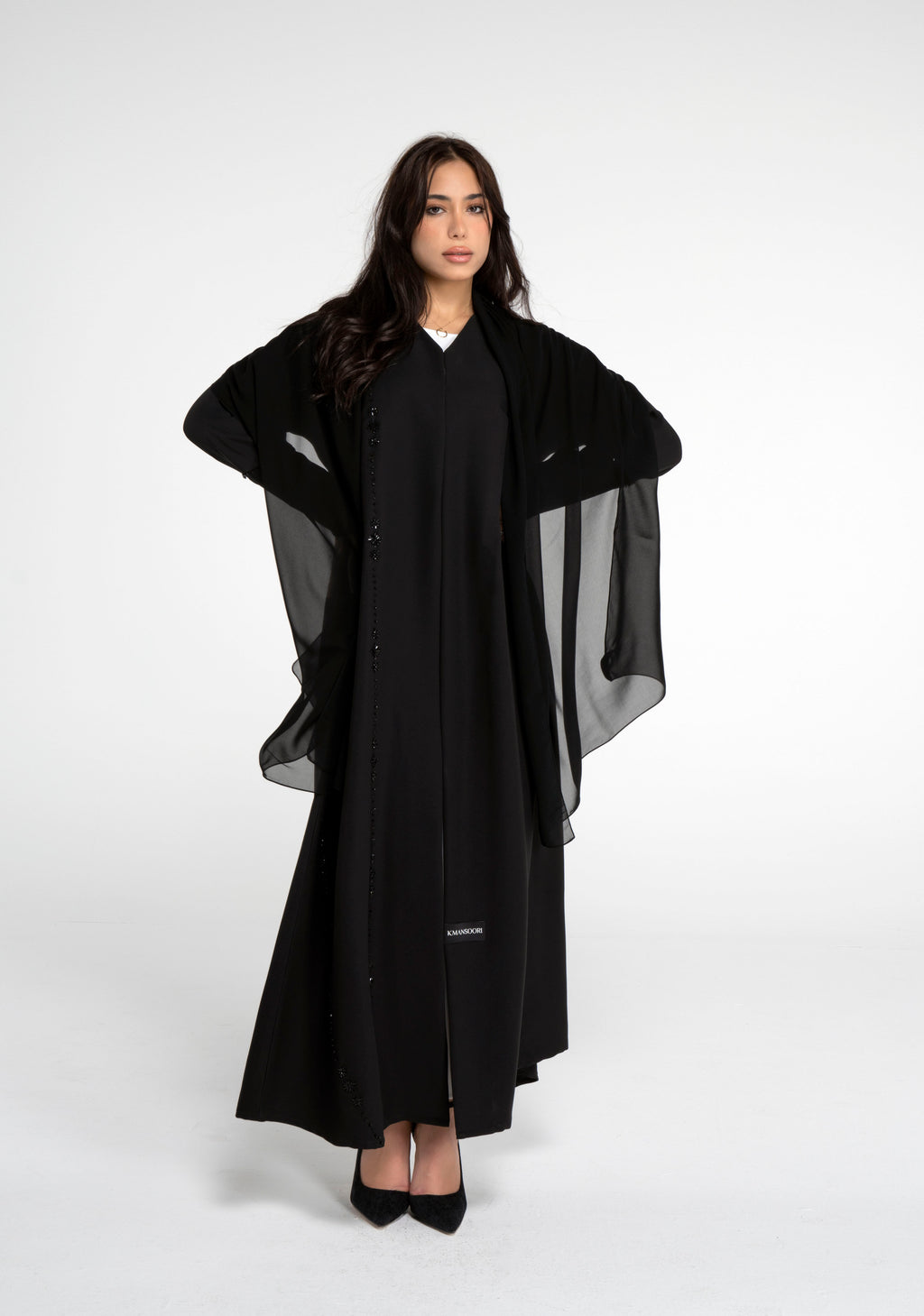 Black abaya with flower motif design line on front and simple bead line on sleeve