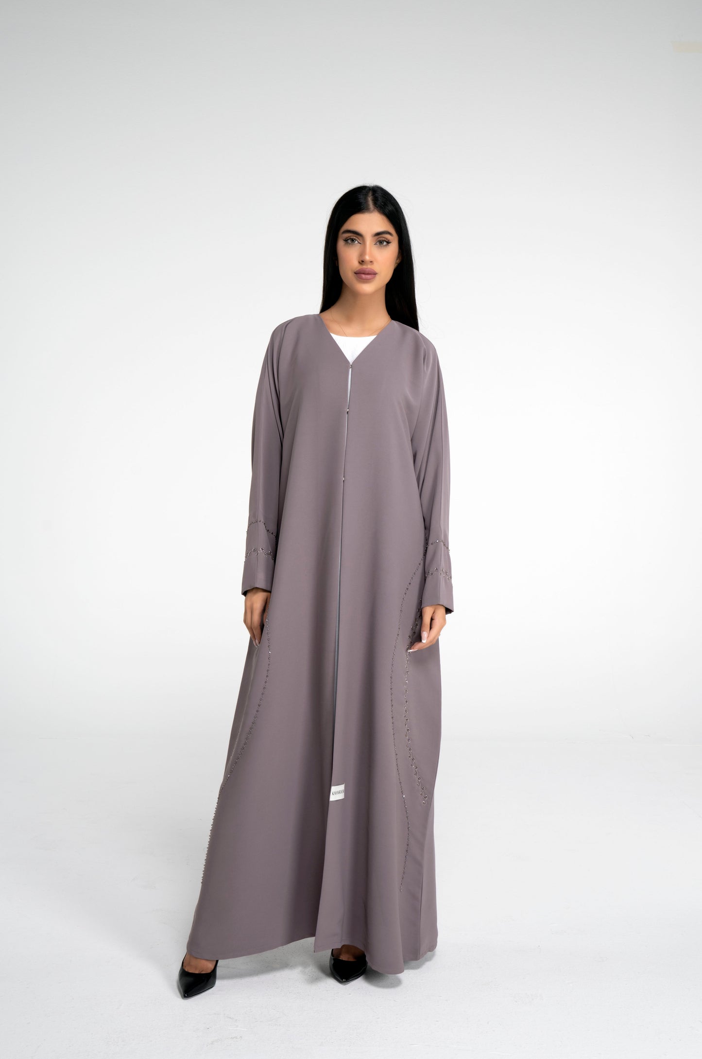 Brown abaya for women with curve designed embellishments on front and sleeve