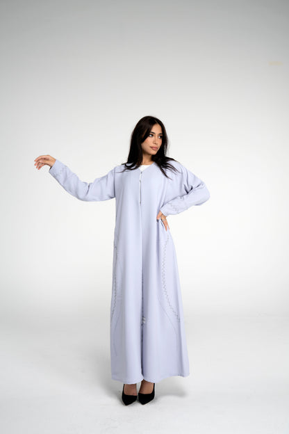 Curve design embellishment on front side and sleeve
