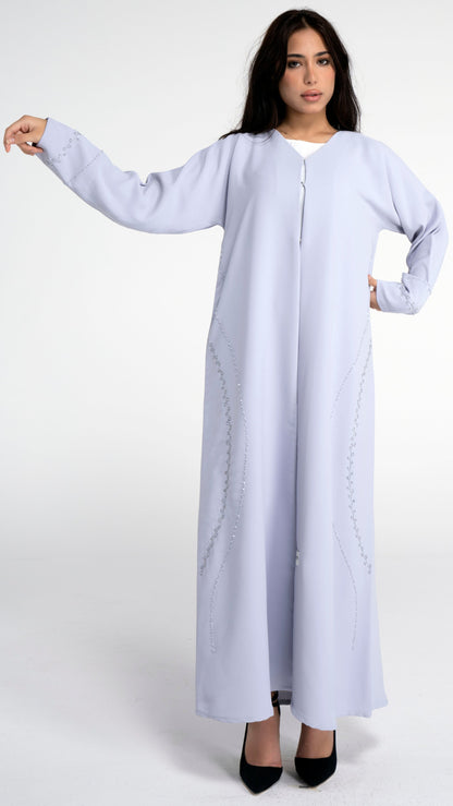 Light grey abaya with curve design embellishment on front side and sleeve