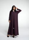 Girl wearing purple abaya with flower motif design line on front and simple bead line on sleeve