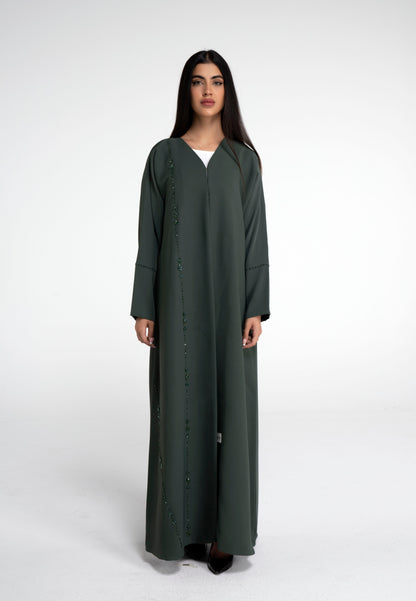 Detailed view of flower motif design line on front and simple bead line on sleeve
