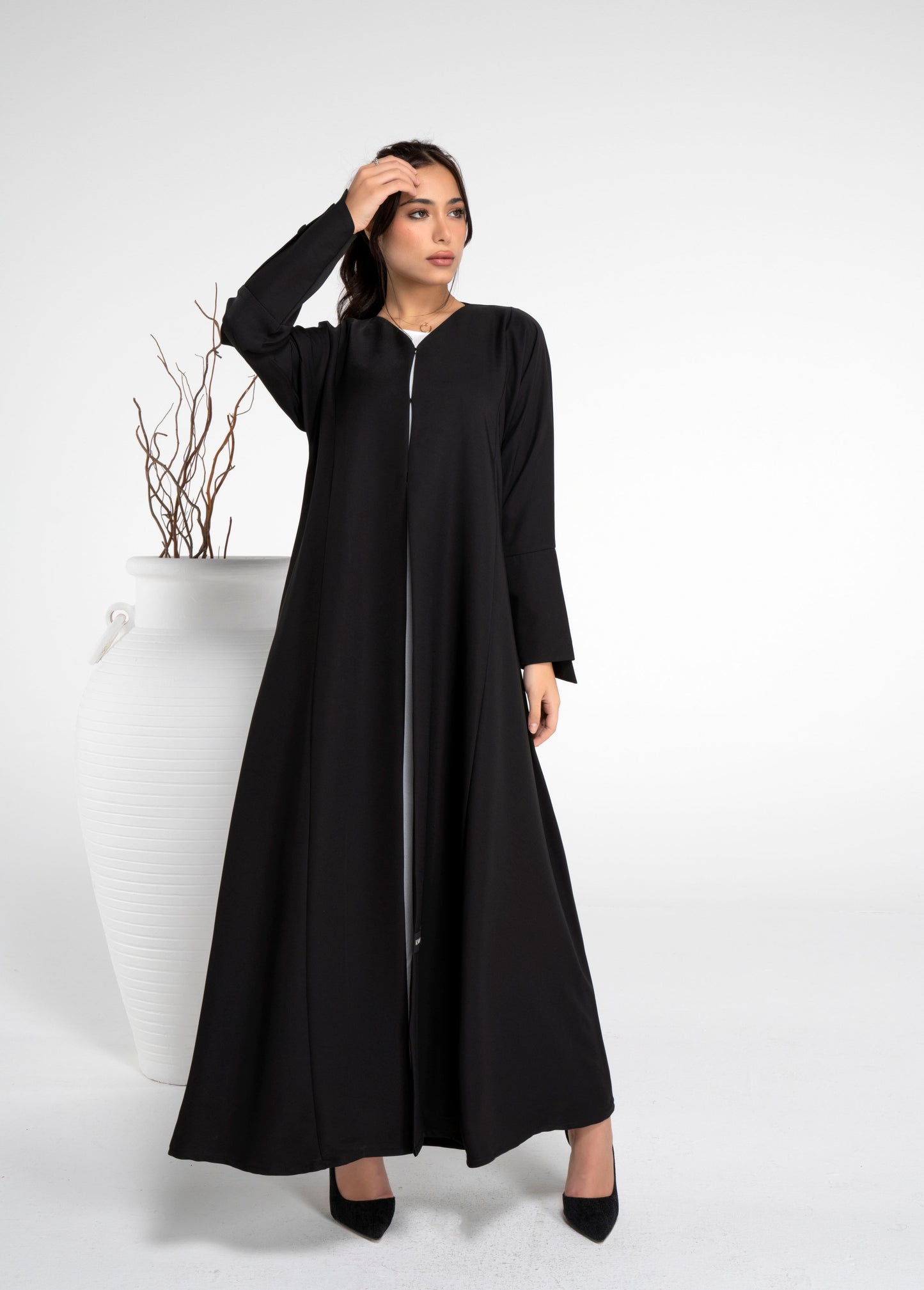 Formal black abaya with stylized sleeve pattern