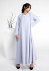 Girl wearing light grey sada abaya for women