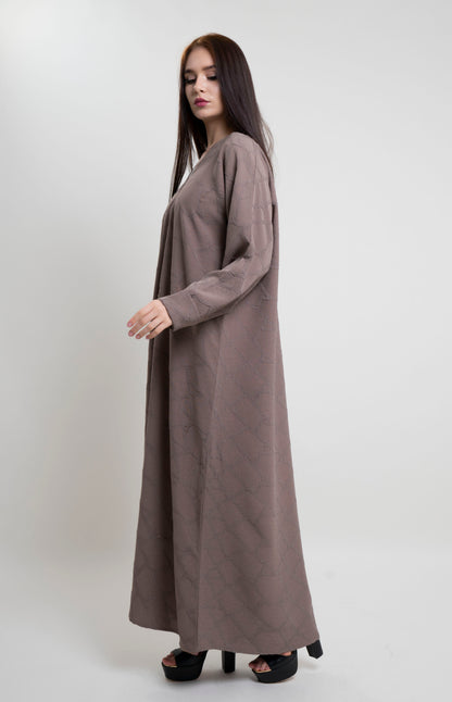 Beige abaya with simple bead highlights for any occasion