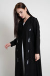 Detailed view of black net designed abaya with embroidery and bead detailing