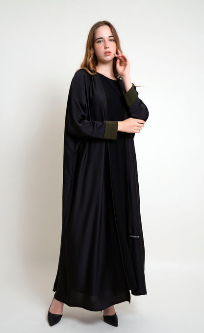 Girl wearing Bahrini Style Abaya With Green Cuff Sleeve